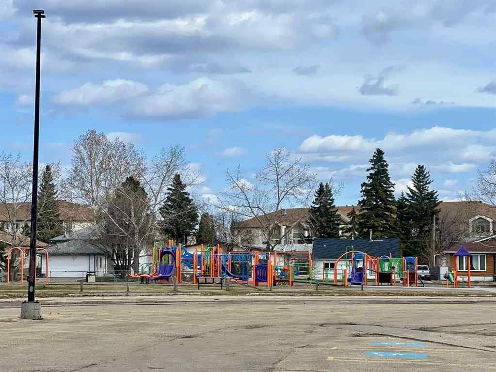 MLS® A2243365 - 10201 93 Street  in Hillside Grande Prairie, Multi-Family