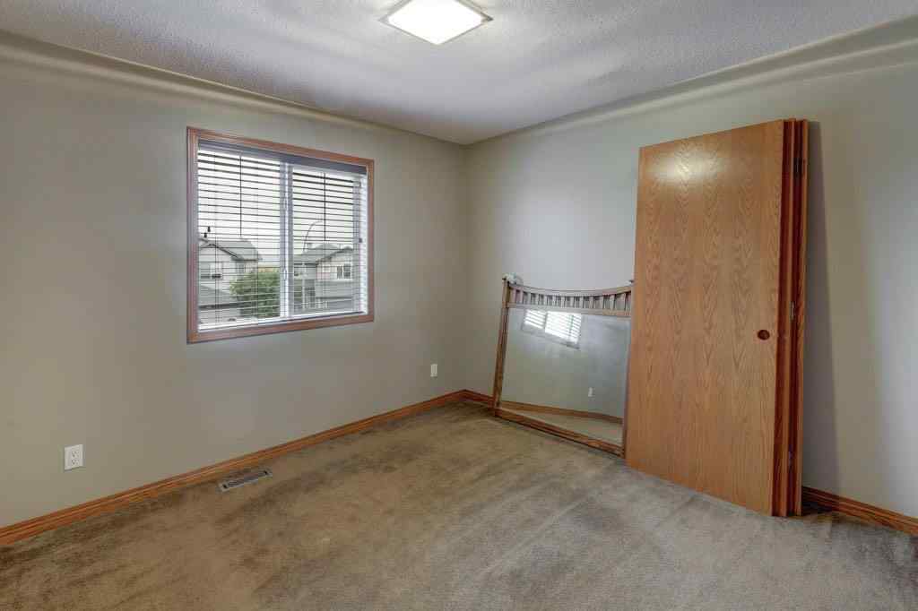 MLS® A2243392 - 2617 Coopers Circle SW in Coopers Crossing Airdrie, Residential