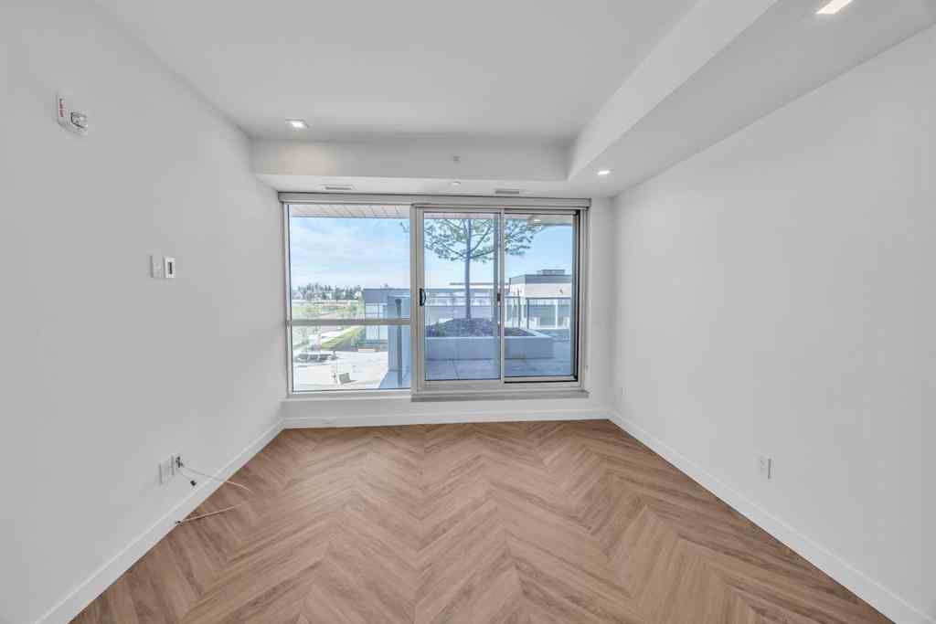 MLS® A2243411 - Unit #217 8505 Broadcast Avenue SW in West Springs Calgary, Residential