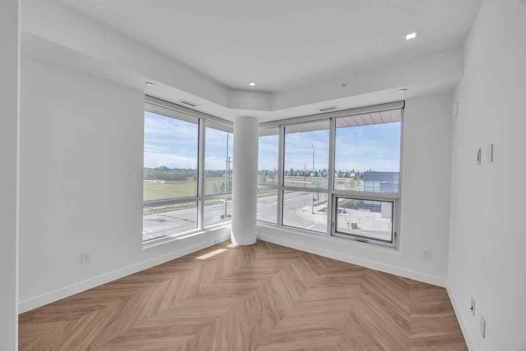 MLS® A2243411 - Unit #217 8505 Broadcast Avenue SW in West Springs Calgary, Residential
