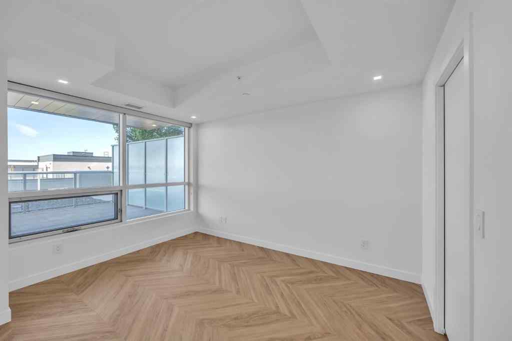 MLS® A2243411 - Unit #217 8505 Broadcast Avenue SW in West Springs Calgary, Residential
