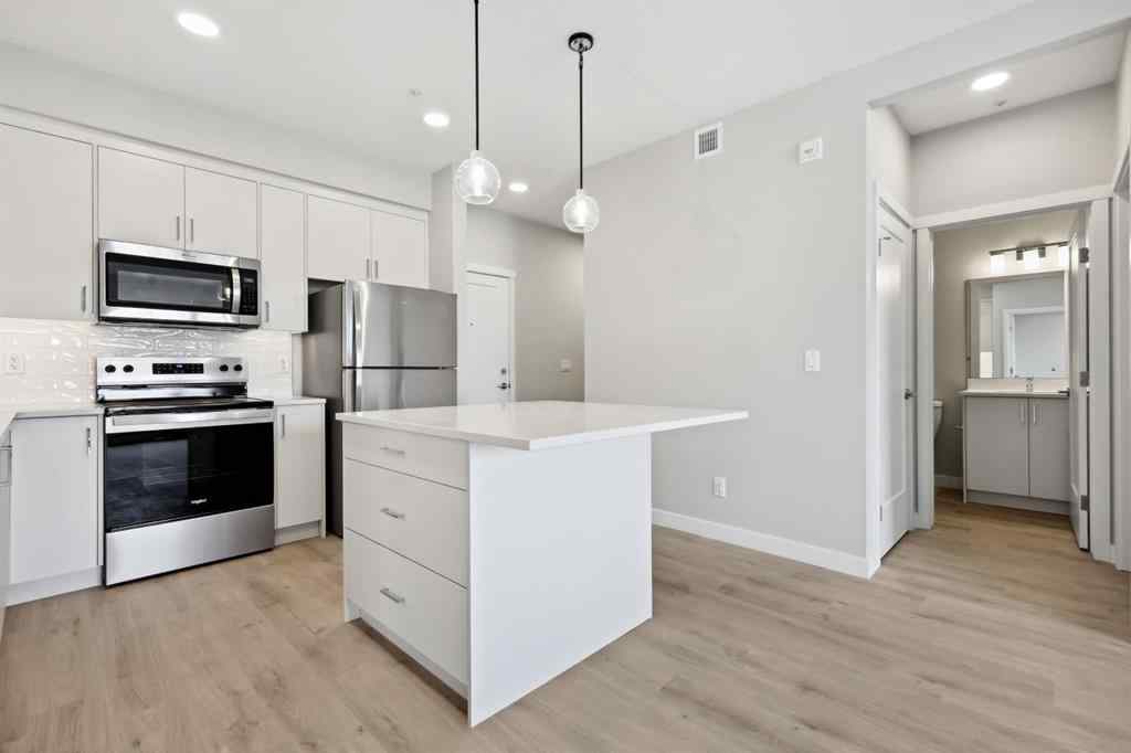 MLS® A2243454 - Unit #104 660 Shawnee Square SW in Shawnee Slopes Calgary, Residential