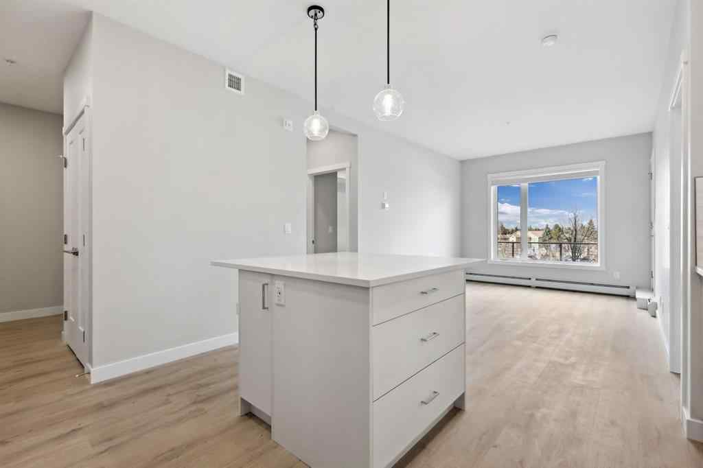 MLS® A2243454 - Unit #104 660 Shawnee Square SW in Shawnee Slopes Calgary, Residential