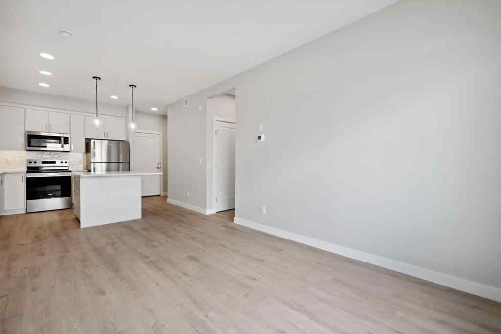 MLS® A2243454 - Unit #104 660 Shawnee Square SW in Shawnee Slopes Calgary, Residential