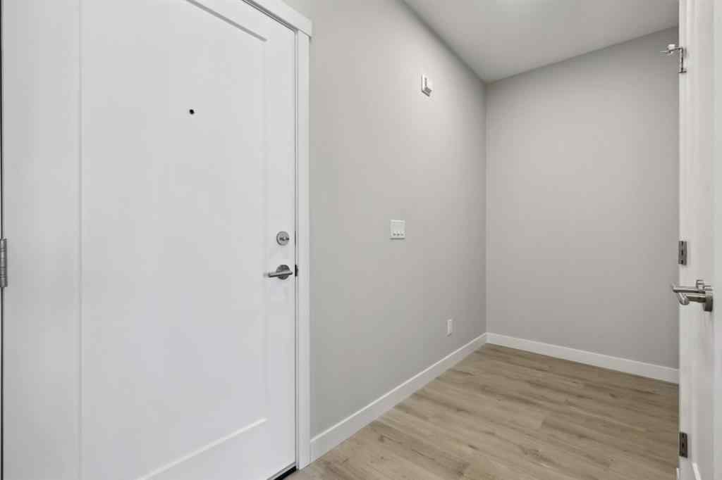 MLS® A2243454 - Unit #104 660 Shawnee Square SW in Shawnee Slopes Calgary, Residential
