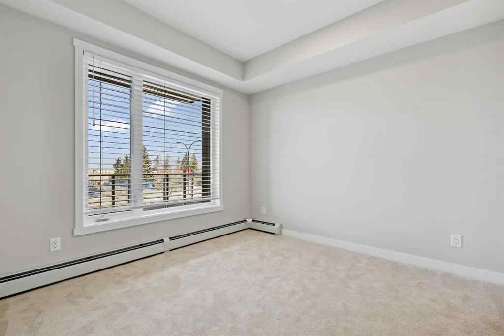 MLS® A2243454 - Unit #104 660 Shawnee Square SW in Shawnee Slopes Calgary, Residential