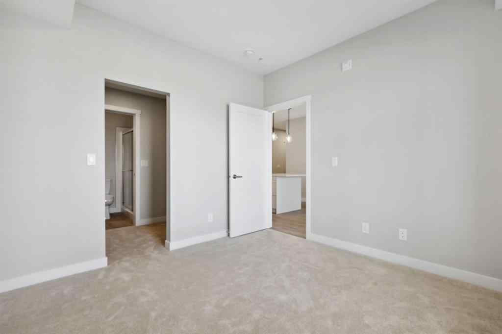 MLS® A2243454 - Unit #104 660 Shawnee Square SW in Shawnee Slopes Calgary, Residential