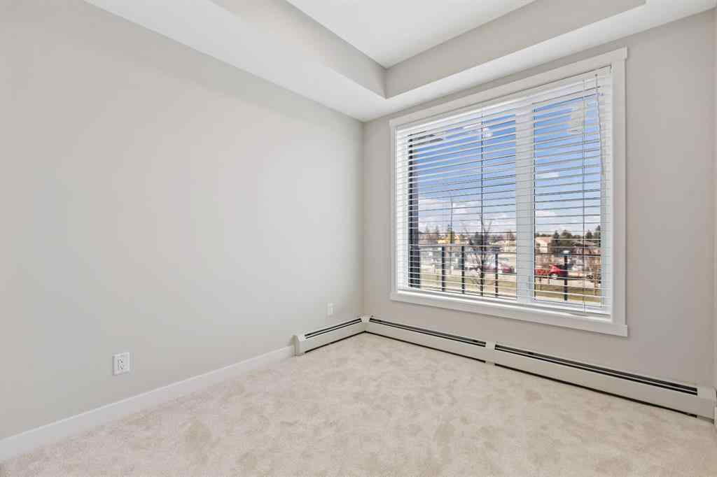 MLS® A2243454 - Unit #104 660 Shawnee Square SW in Shawnee Slopes Calgary, Residential