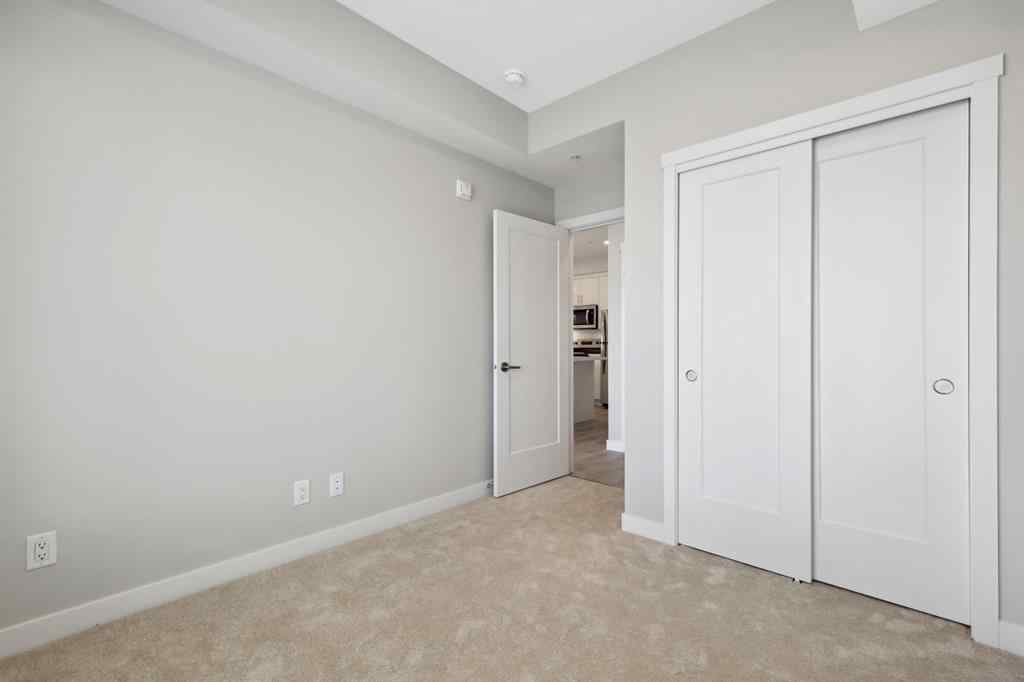 MLS® A2243454 - Unit #104 660 Shawnee Square SW in Shawnee Slopes Calgary, Residential