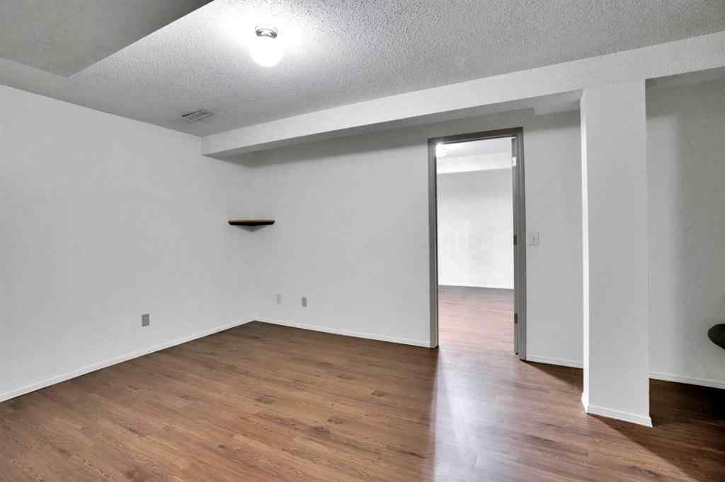 MLS® A2243458 - 18 Erin Ridge Road SE in Erin Woods Calgary, Residential