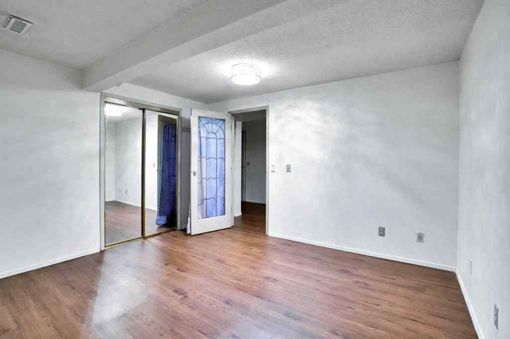 MLS® A2243458 - 18 Erin Ridge Road SE in Erin Woods Calgary, Residential