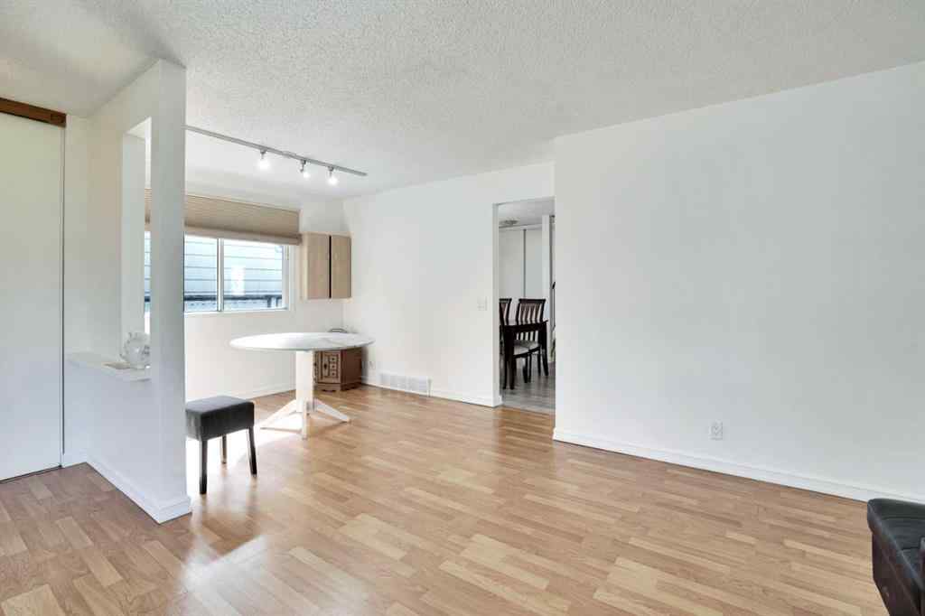 MLS® A2243458 - 18 Erin Ridge Road SE in Erin Woods Calgary, Residential