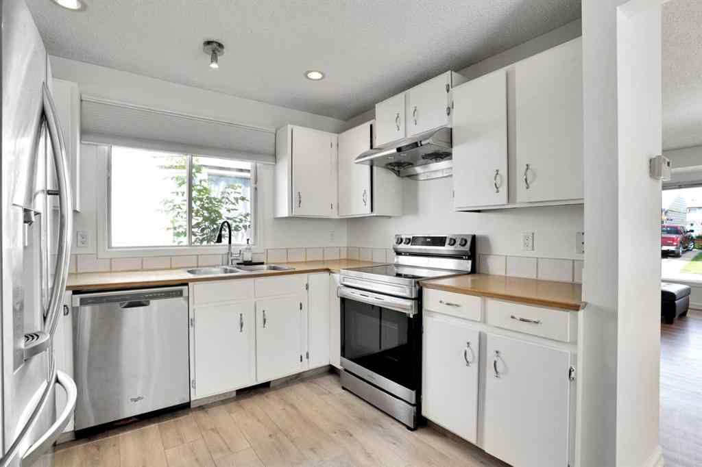 MLS® A2243458 - 18 Erin Ridge Road SE in Erin Woods Calgary, Residential