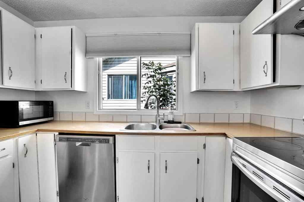 MLS® A2243458 - 18 Erin Ridge Road SE in Erin Woods Calgary, Residential