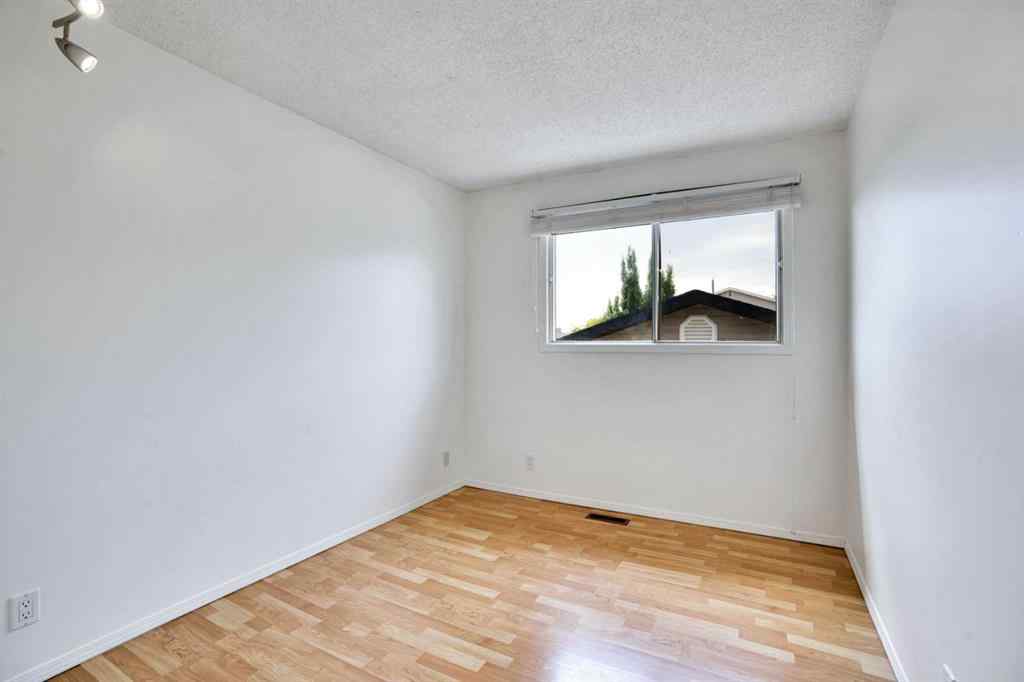 MLS® A2243458 - 18 Erin Ridge Road SE in Erin Woods Calgary, Residential