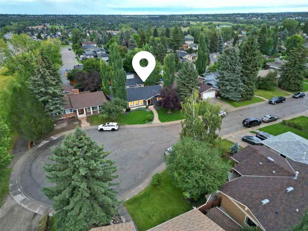 MLS® A2243470 - 136 Parkridge Place SE in Parkland Calgary, Residential