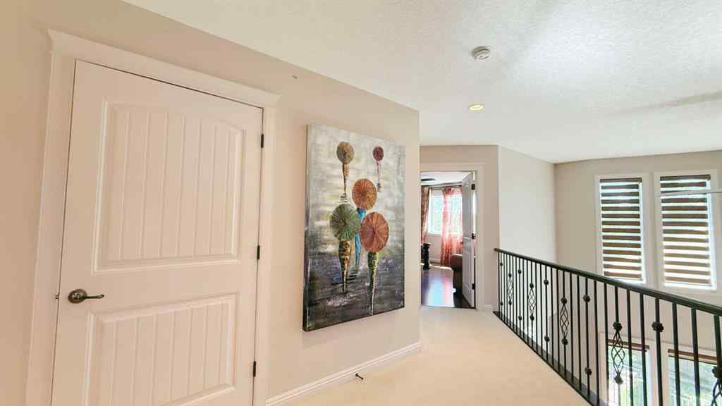 MLS® A2243518 - 8101 9 Avenue SW in West Springs Calgary, Residential