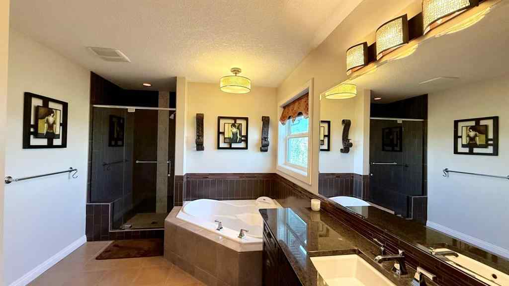 MLS® A2243518 - 8101 9 Avenue SW in West Springs Calgary, Residential