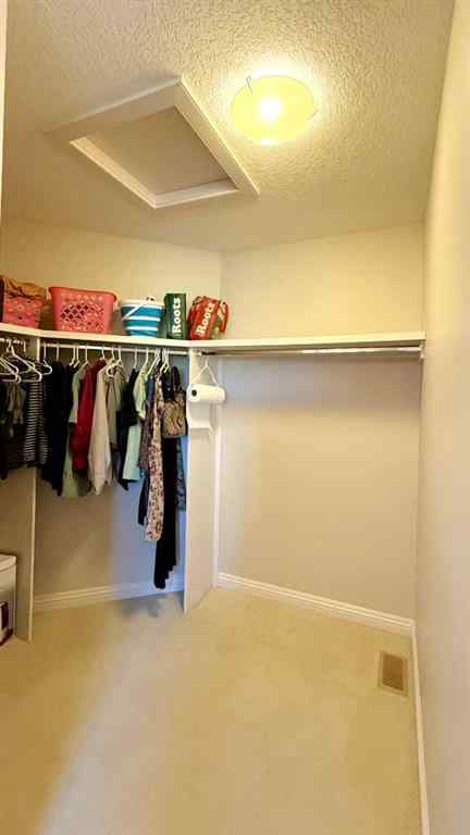 MLS® A2243518 - 8101 9 Avenue SW in West Springs Calgary, Residential