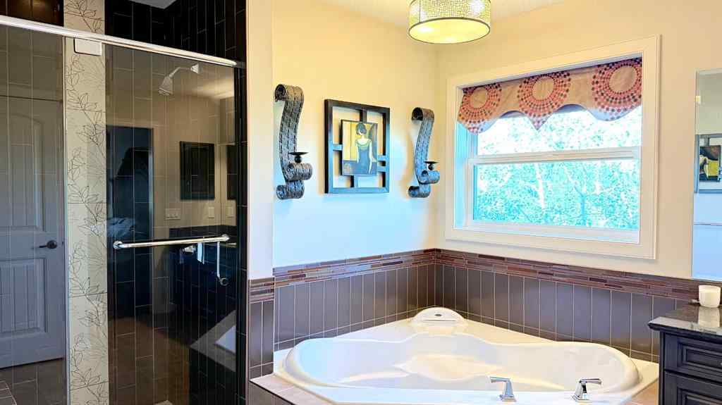 MLS® A2243518 - 8101 9 Avenue SW in West Springs Calgary, Residential
