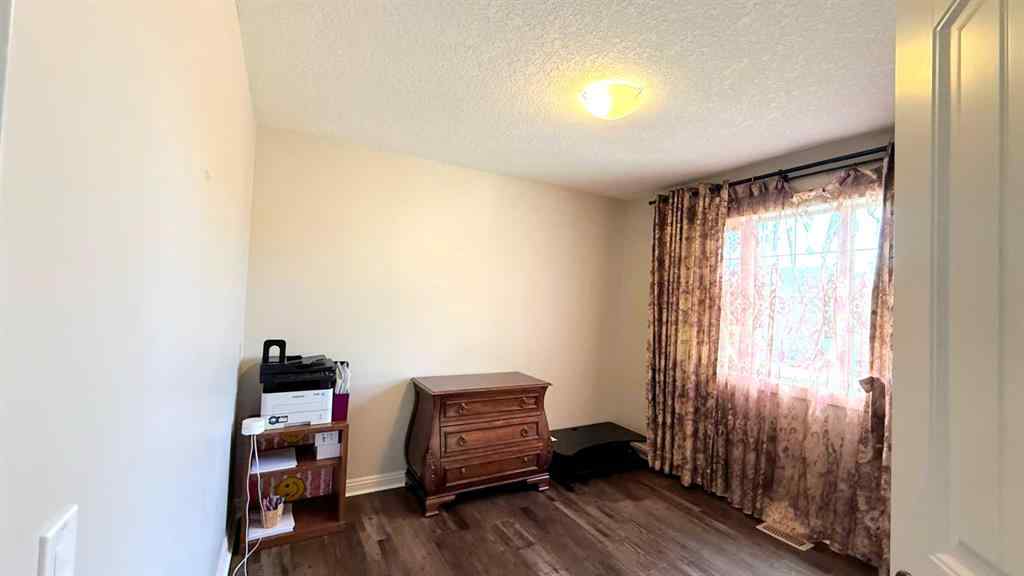 MLS® A2243518 - 8101 9 Avenue SW in West Springs Calgary, Residential