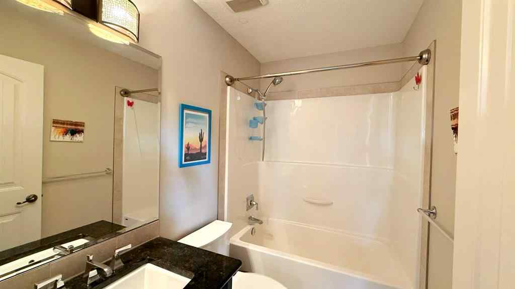 MLS® A2243518 - 8101 9 Avenue SW in West Springs Calgary, Residential