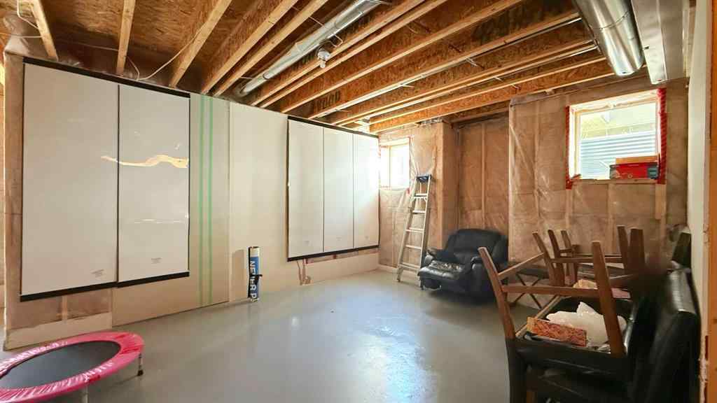 MLS® A2243518 - 8101 9 Avenue SW in West Springs Calgary, Residential
