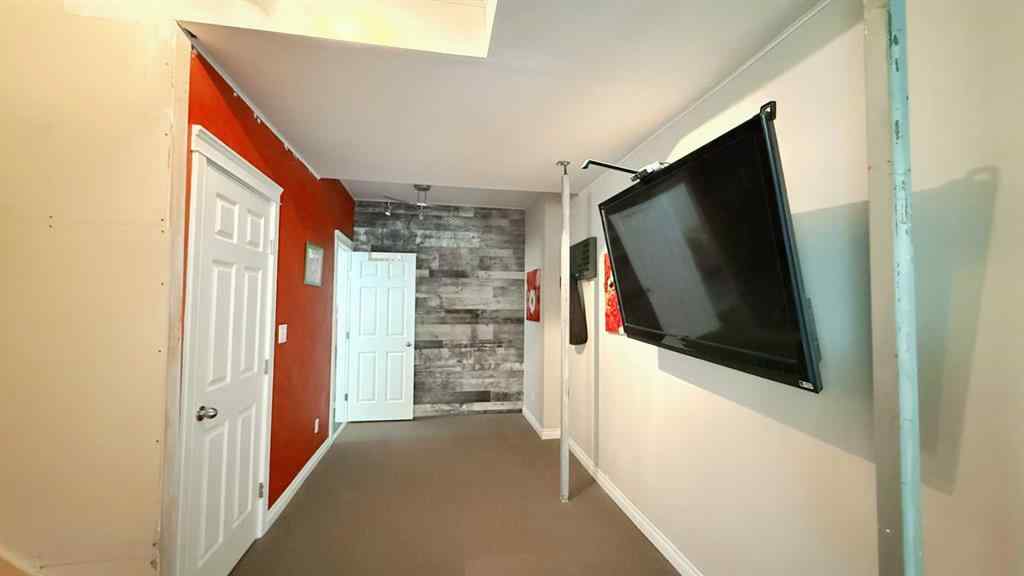 MLS® A2243518 - 8101 9 Avenue SW in West Springs Calgary, Residential