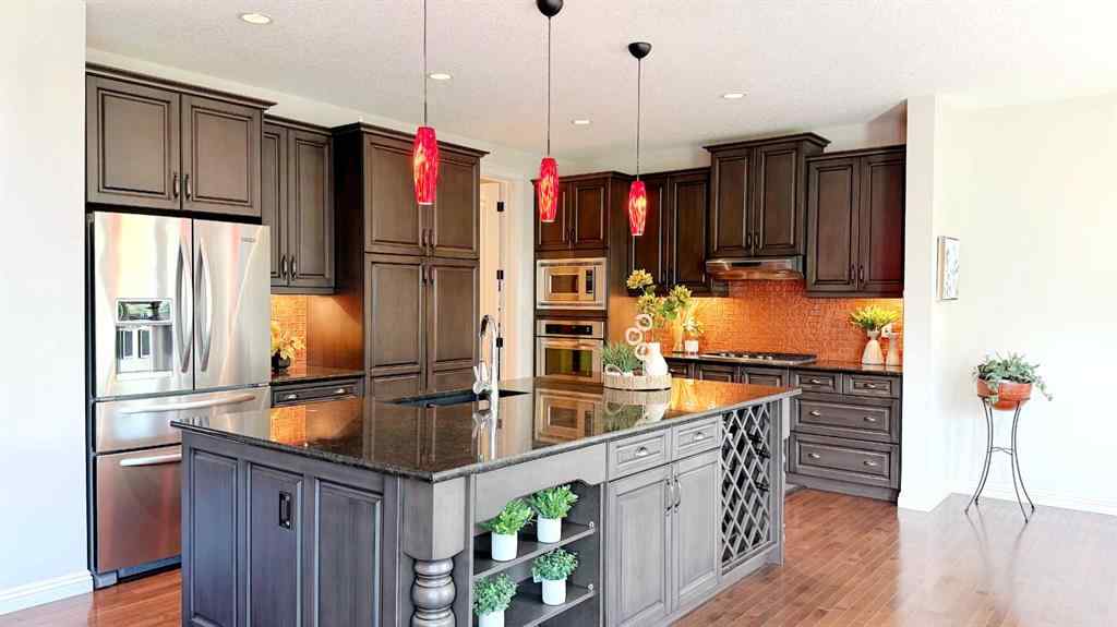 MLS® A2243518 - 8101 9 Avenue SW in West Springs Calgary, Residential