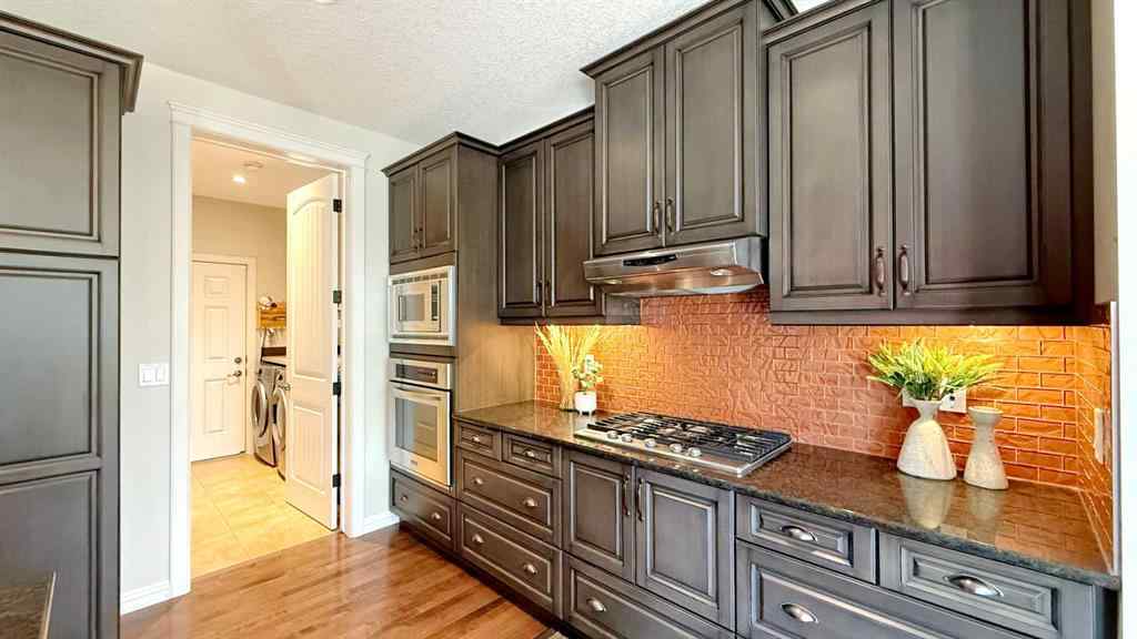 MLS® A2243518 - 8101 9 Avenue SW in West Springs Calgary, Residential