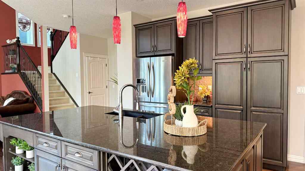 MLS® A2243518 - 8101 9 Avenue SW in West Springs Calgary, Residential