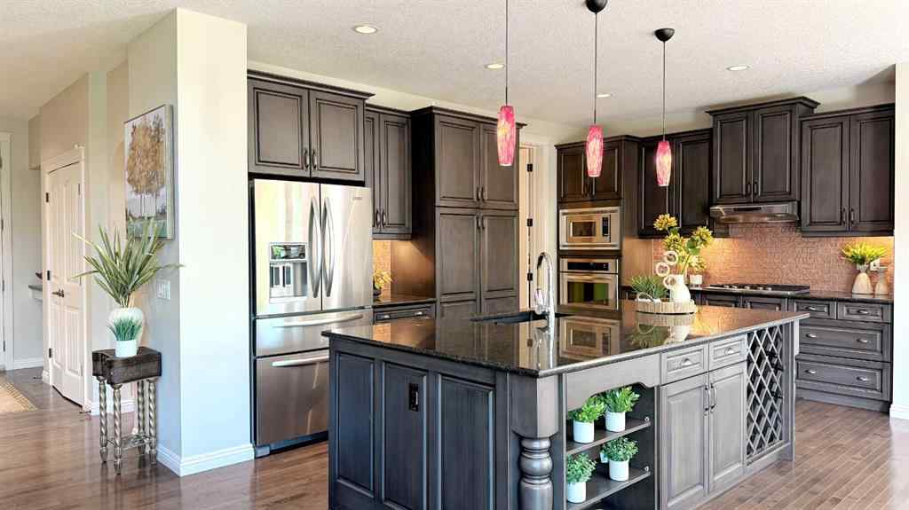 MLS® A2243518 - 8101 9 Avenue SW in West Springs Calgary, Residential