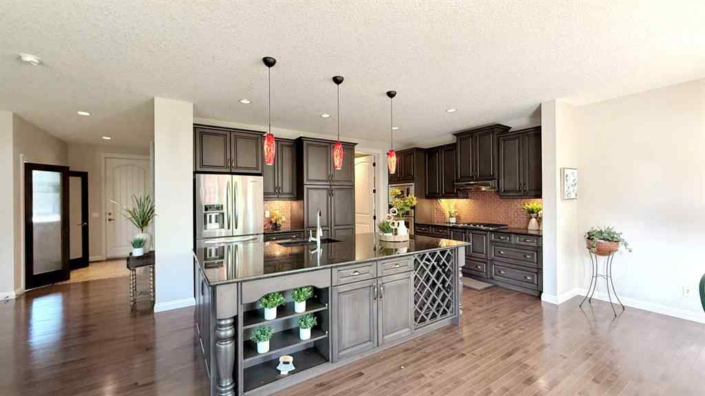 MLS® A2243518 - 8101 9 Avenue SW in West Springs Calgary, Residential