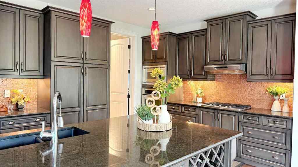 MLS® A2243518 - 8101 9 Avenue SW in West Springs Calgary, Residential