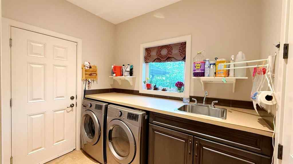 MLS® A2243518 - 8101 9 Avenue SW in West Springs Calgary, Residential