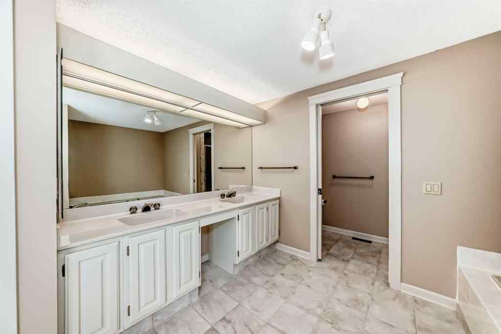 MLS® A2243556 - 22 Wood Crescent SW in Woodlands Calgary, Residential