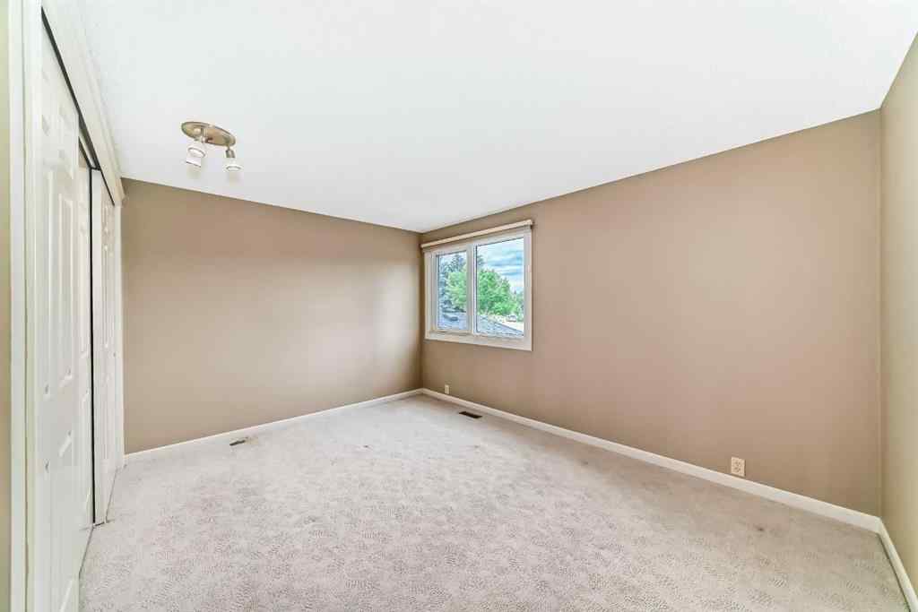 MLS® A2243556 - 22 Wood Crescent SW in Woodlands Calgary, Residential
