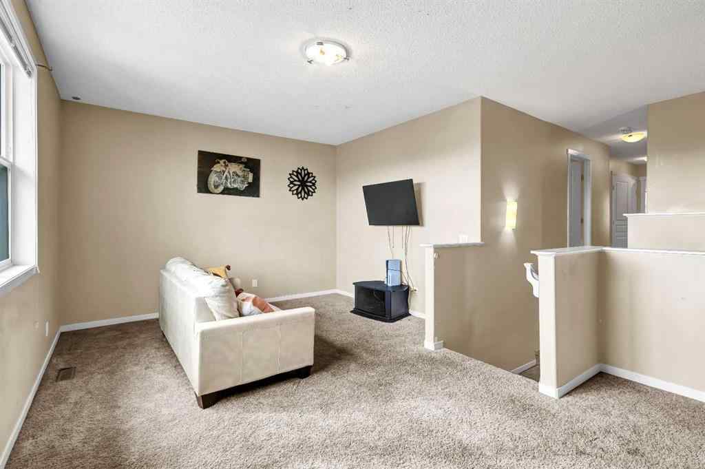MLS® A2243560 - 216 Copperpond Green SE in Copperfield Calgary, Residential