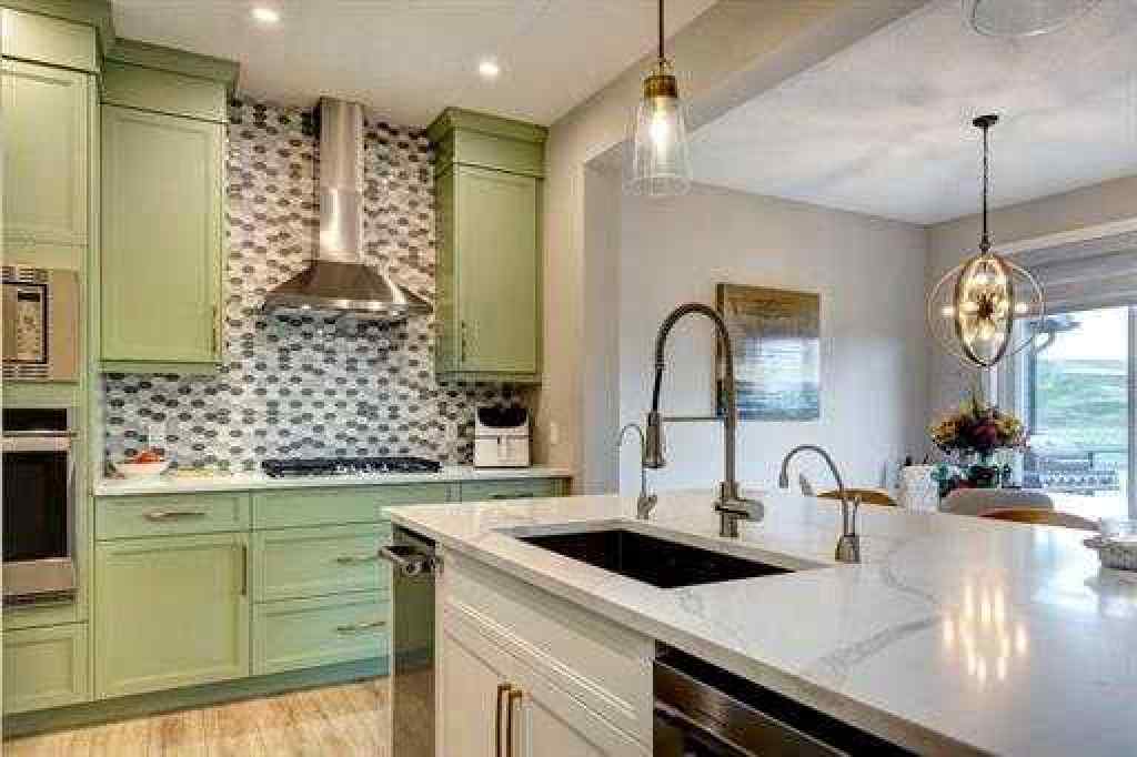 MLS® A2243562 - 144 Cranbrook Gardens SE in Cranston Calgary, Residential