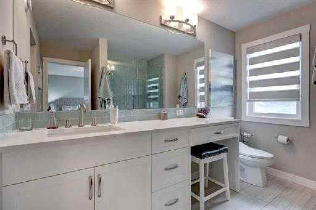 MLS® A2243562 - 144 Cranbrook Gardens SE in Cranston Calgary, Residential