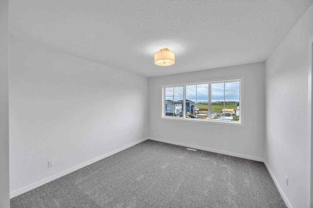 MLS® A2243565 - 454 & 458 Carringvue Grove  in Carrington Calgary, Residential