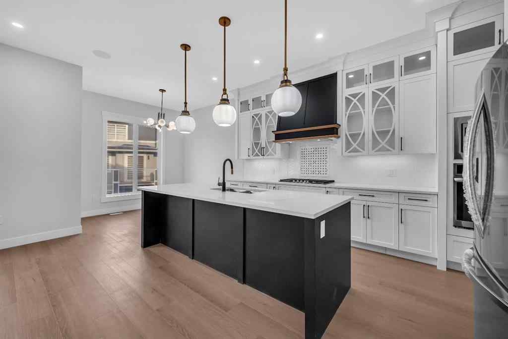 MLS® A2243570 - 203 KINNIBURGH Place  in Kinniburgh North Chestermere, Residential