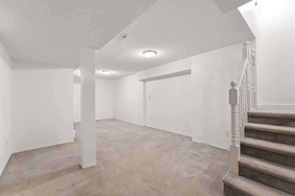 MLS® A2243586 - 38 Coachway Gardens SW in Coach Hill Calgary, Residential