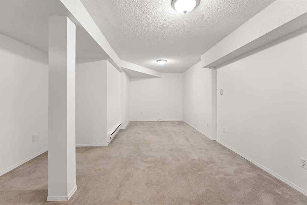 MLS® A2243586 - 38 Coachway Gardens SW in Coach Hill Calgary, Residential
