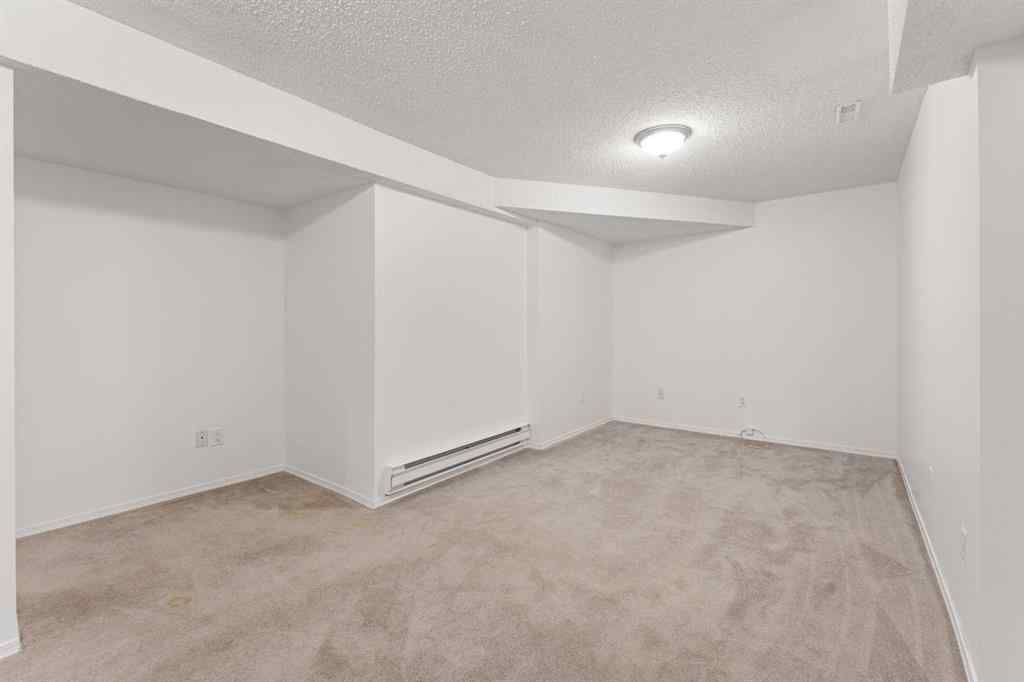 MLS® A2243586 - 38 Coachway Gardens SW in Coach Hill Calgary, Residential