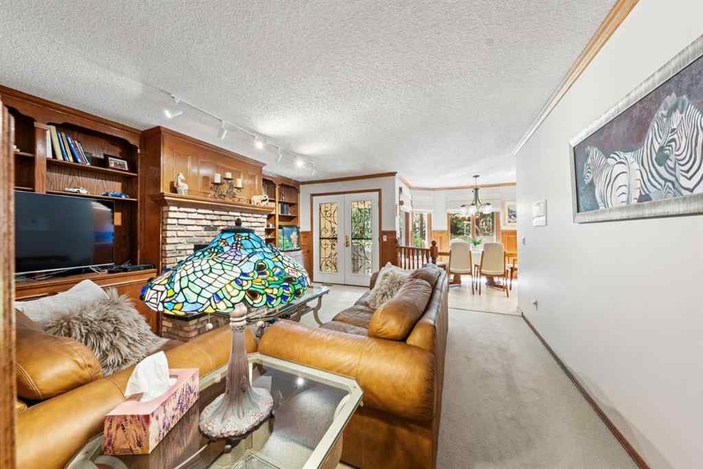 MLS® A2243640 - 9948 Patton Road SW in Pump Hill Calgary, Residential