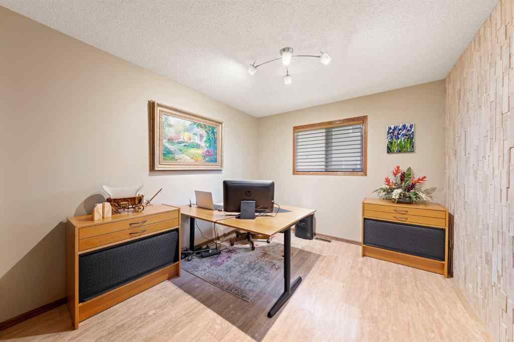 MLS® A2243640 - 9948 Patton Road SW in Pump Hill Calgary, Residential