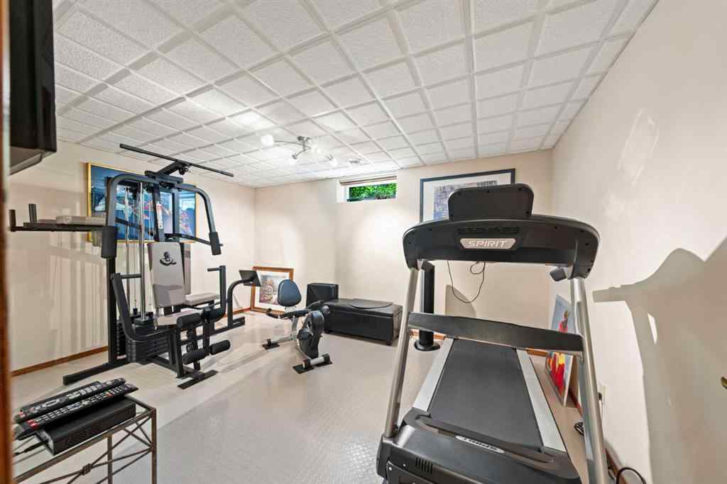 MLS® A2243640 - 9948 Patton Road SW in Pump Hill Calgary, Residential