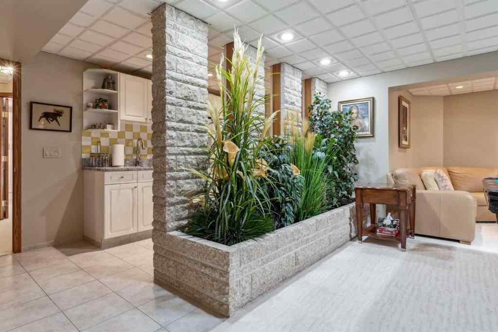MLS® A2243640 - 9948 Patton Road SW in Pump Hill Calgary, Residential