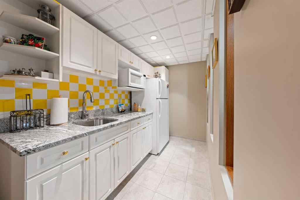 MLS® A2243640 - 9948 Patton Road SW in Pump Hill Calgary, Residential